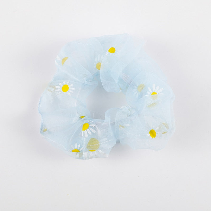 Girl's scrunchie hair tie with flower motif