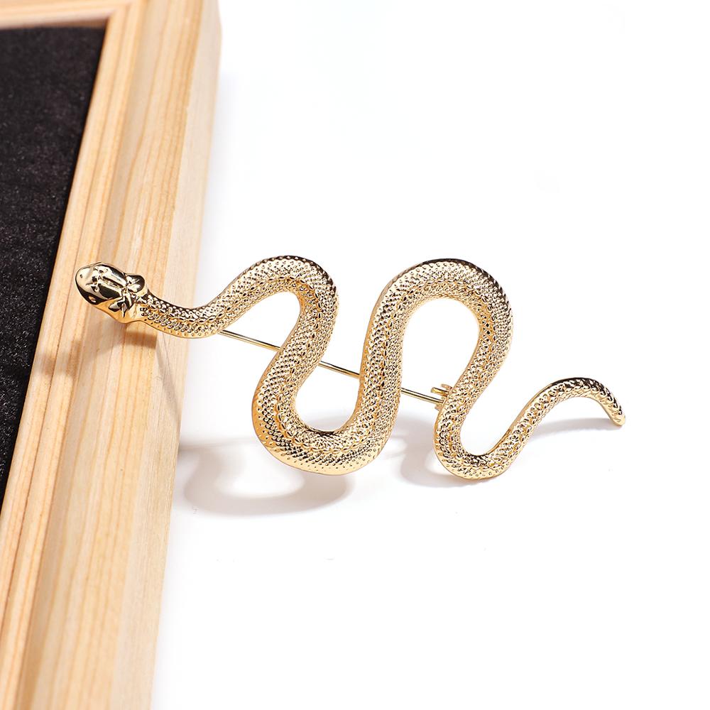 Snake motif brooch