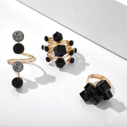 Ring with black stones