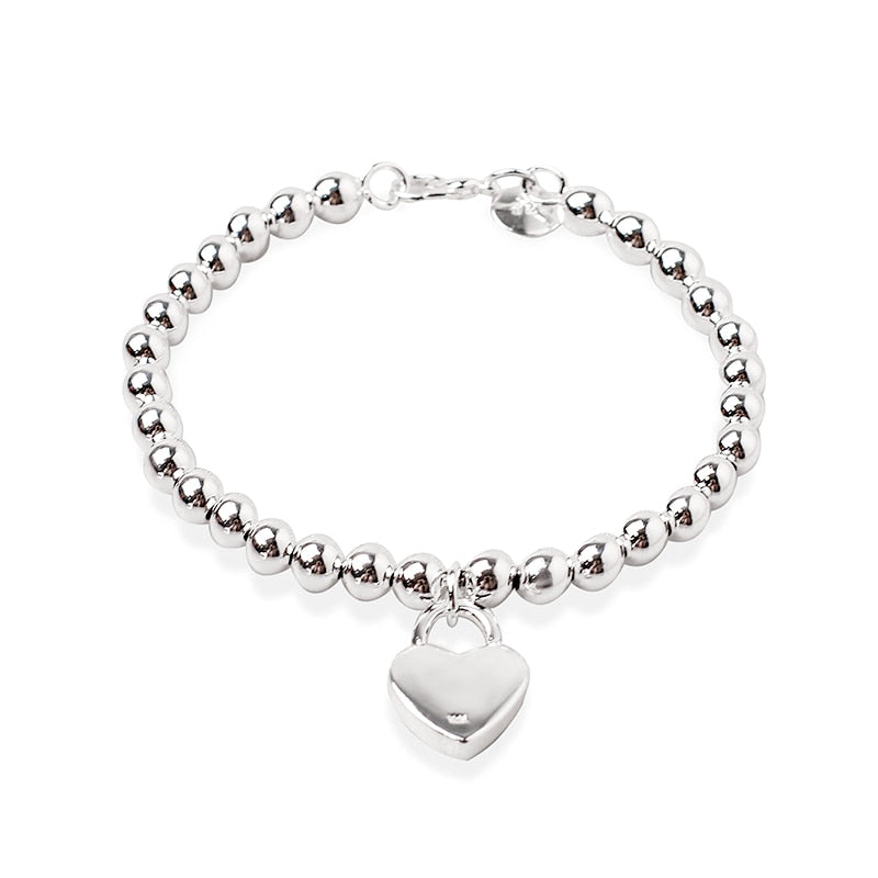 Bracelet with a heart-shaped pendant