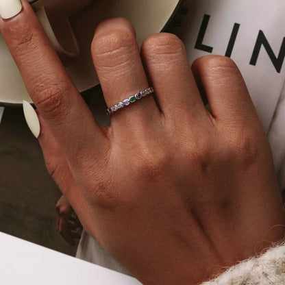 Ring with colorful zircons