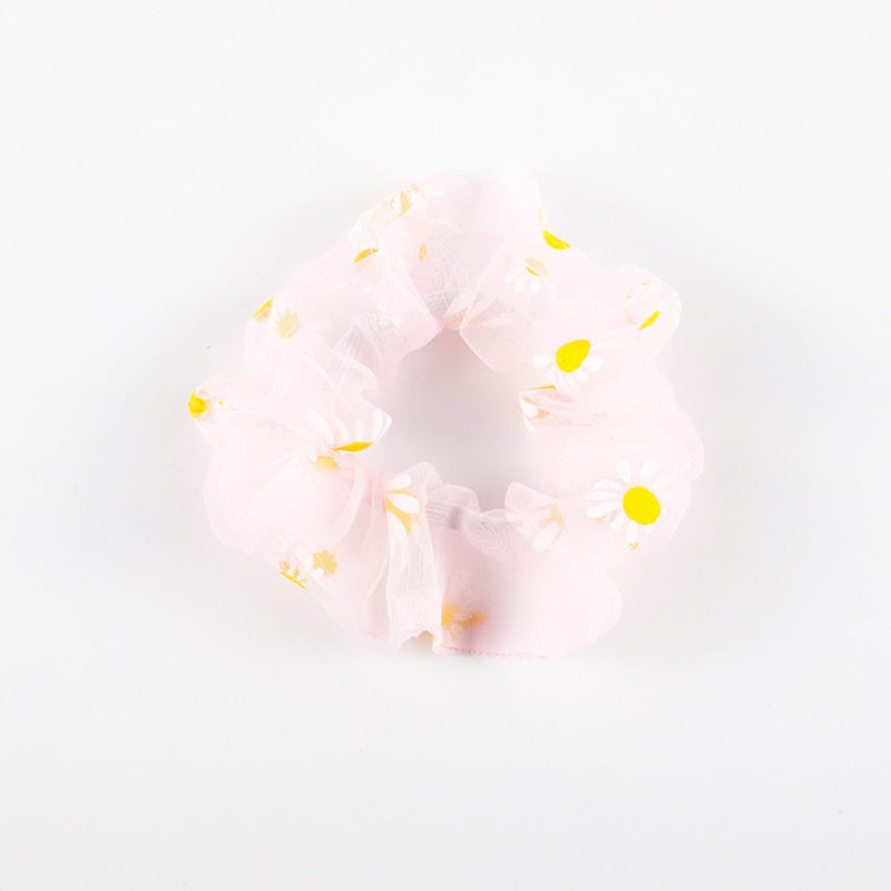 Girl's scrunchie hair tie with flower motif