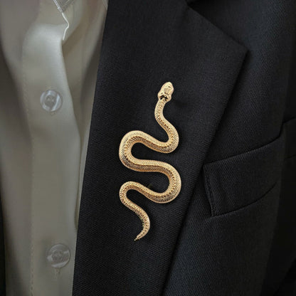 Snake motif brooch