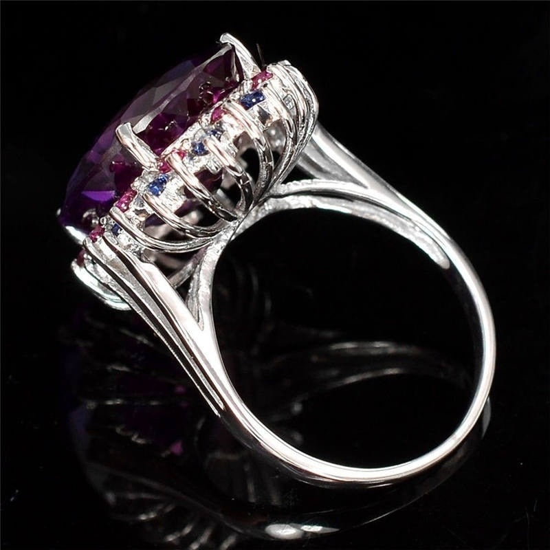 Ring with a purple stone