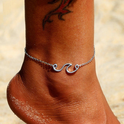 Minimalistic ankle bracelet with a wave motif