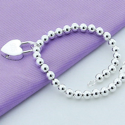 Bracelet with a heart-shaped pendant