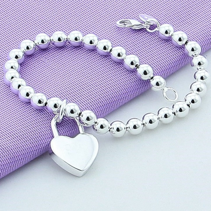 Bracelet with a heart-shaped pendant