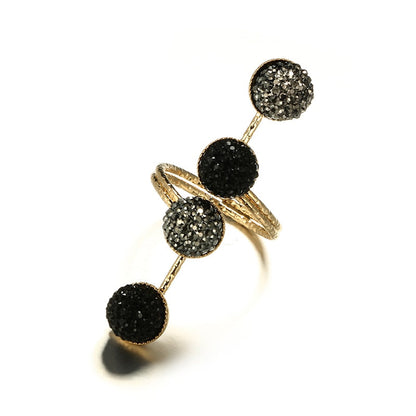 Ring with black stones