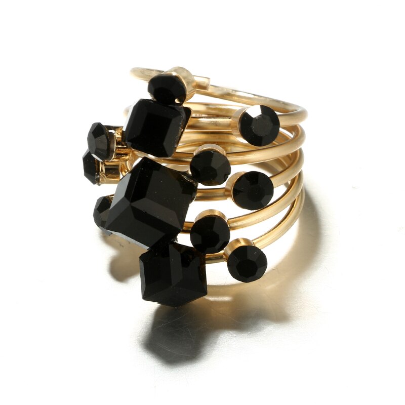 Ring with black stones