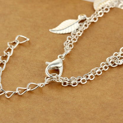 Ankle bracelet with leaf-shaped pendants