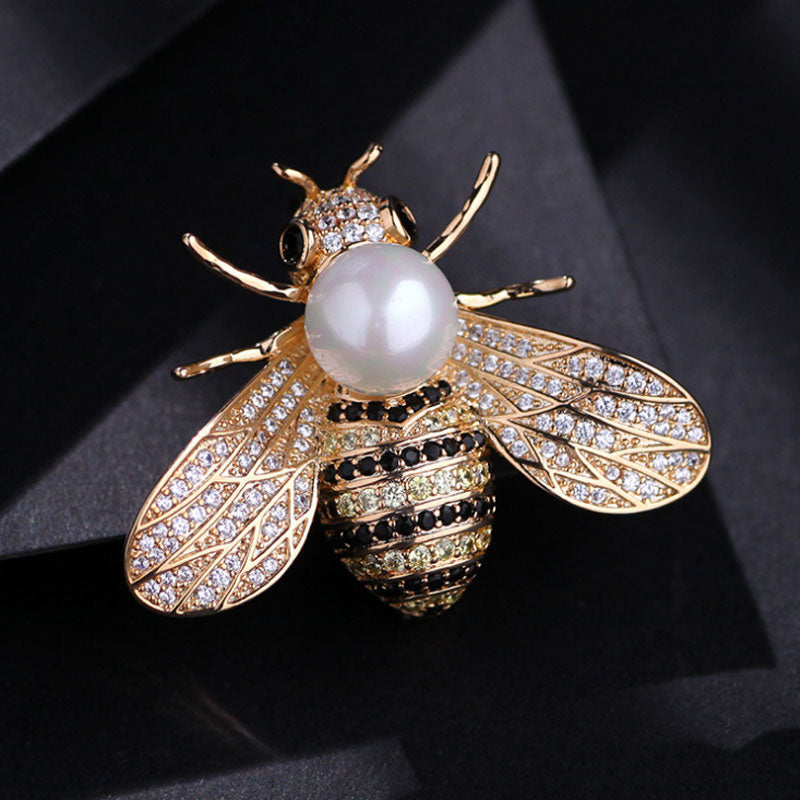 Brooch with a pearl imitation - bee