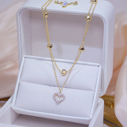 Double necklace with a heart