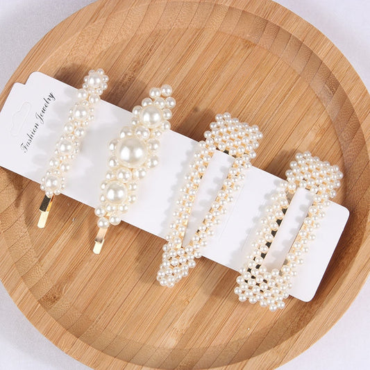 Set of hair clips with imitation pearls