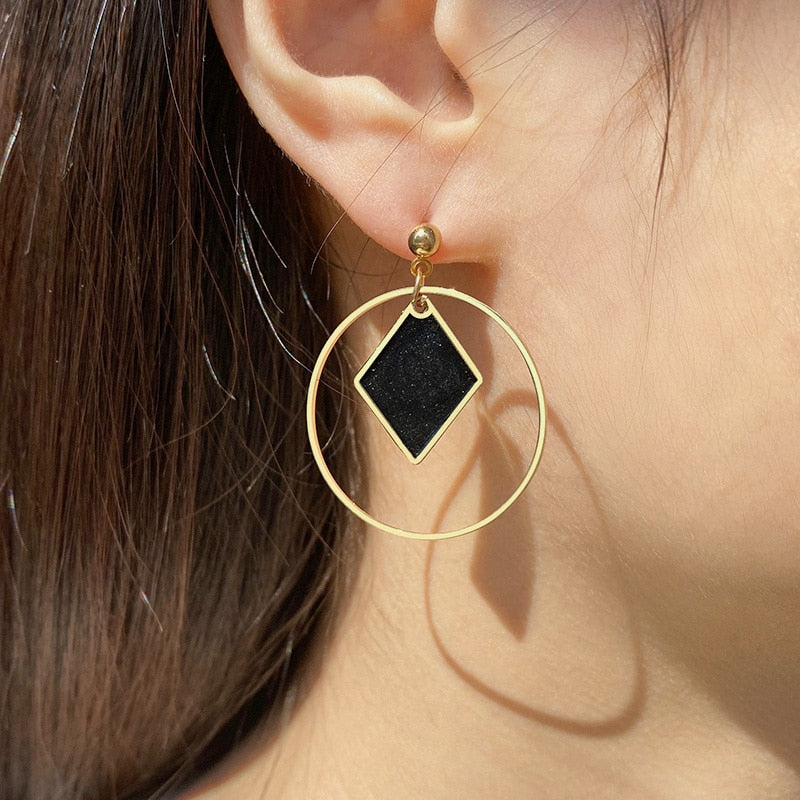 Hanging geometric earrings