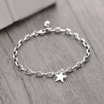 Silver bracelet with a star