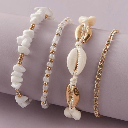 Set of ankle bracelets with shells