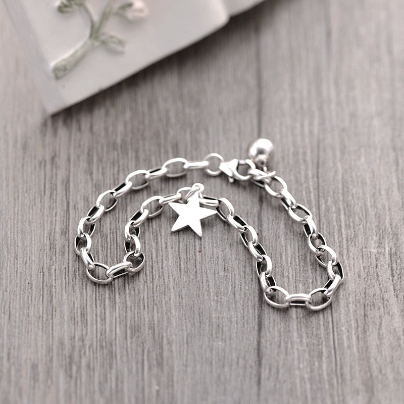 Silver bracelet with a star