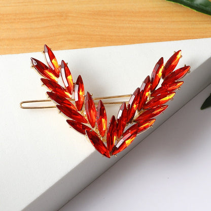 Hair clip in the shape of the letter "V"