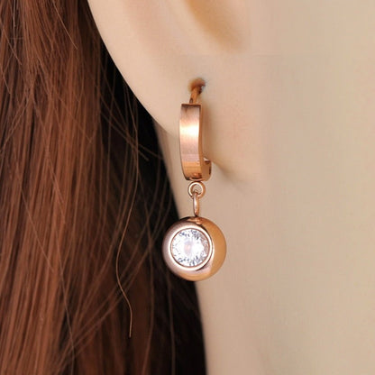 Hanging ball earrings