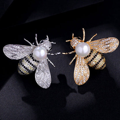 Brooch with a pearl imitation - bee