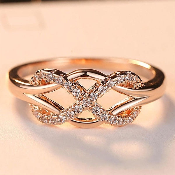 Infinity sign motif ring