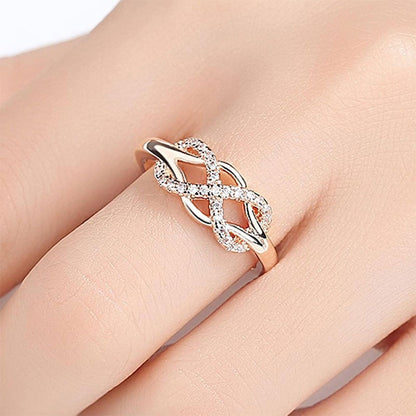 Infinity sign motif ring