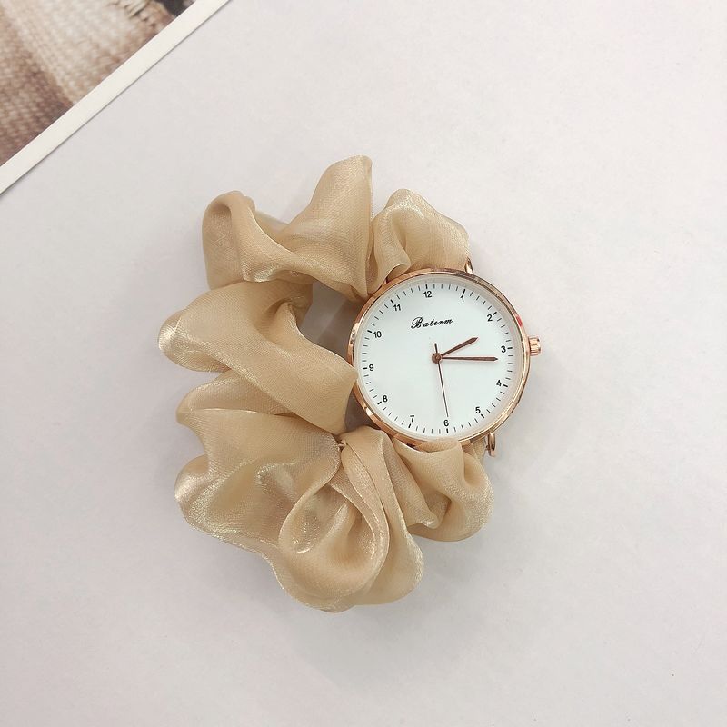 Ladies watch with a scrunchie bracelet