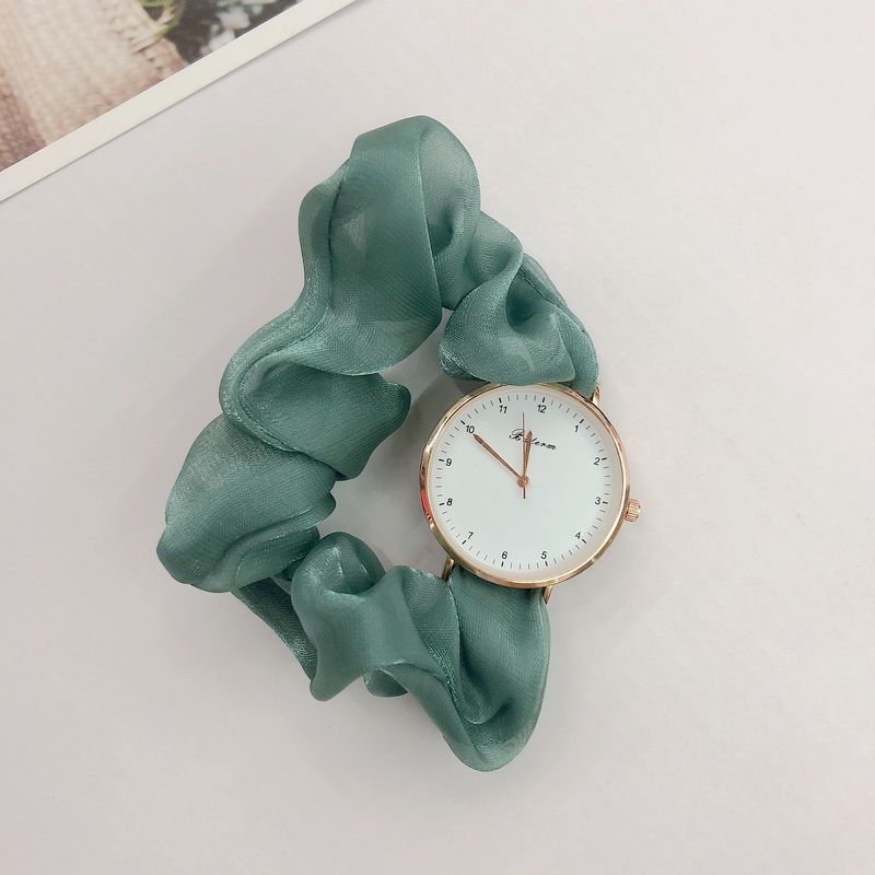 Ladies watch with a scrunchie bracelet