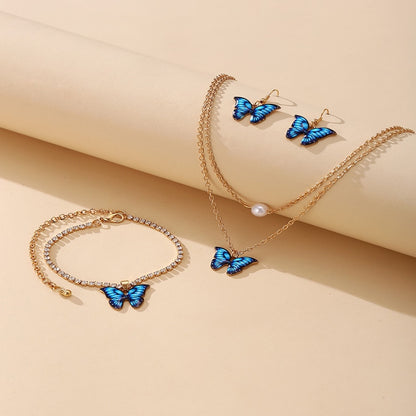 A set of jewelry with butterflies