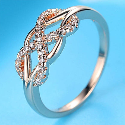 Infinity sign motif ring