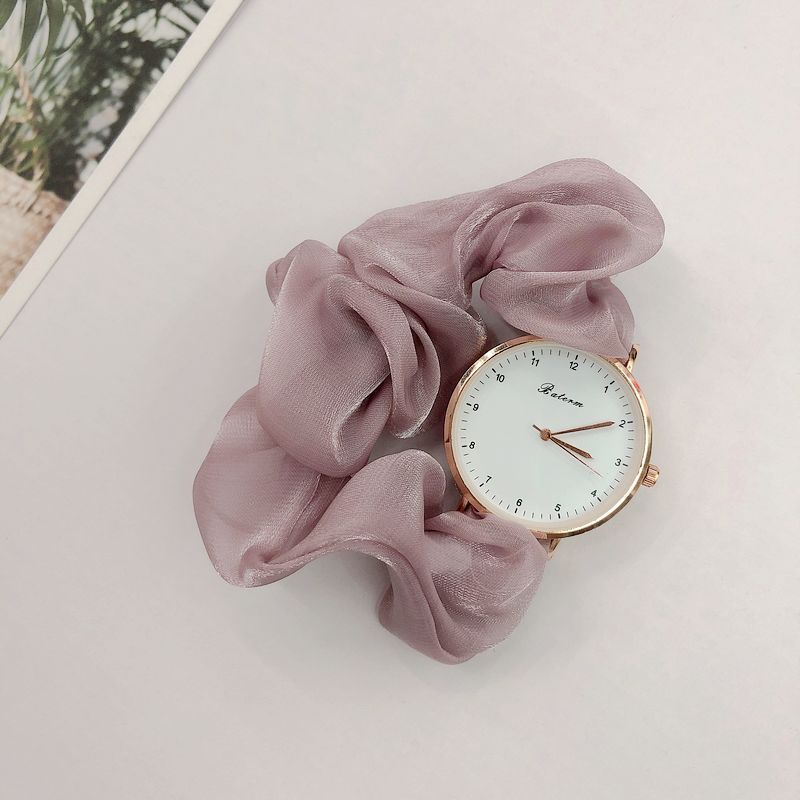 Ladies watch with a scrunchie bracelet