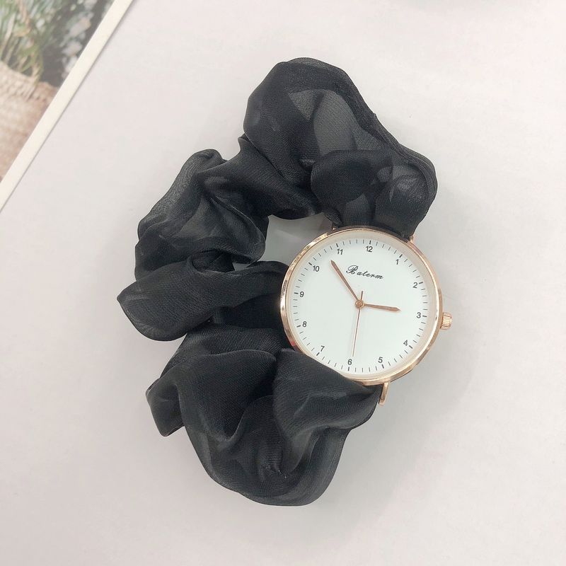 Ladies watch with a scrunchie bracelet