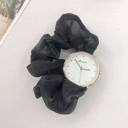 Ladies watch with a scrunchie bracelet