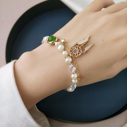 Bracelet with a pendant in the shape of a dream catcher