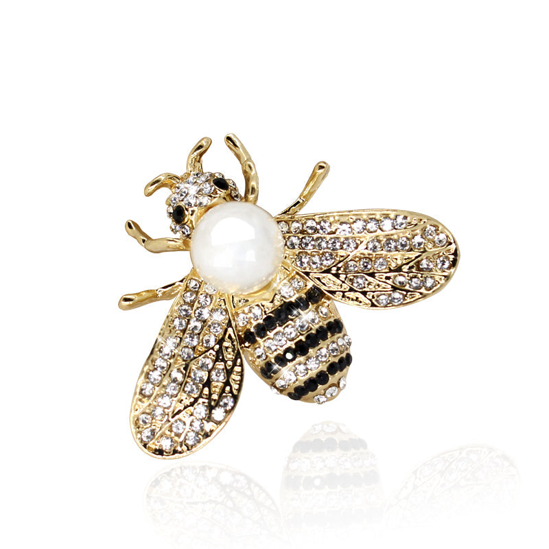 Brooch with a pearl imitation - bee