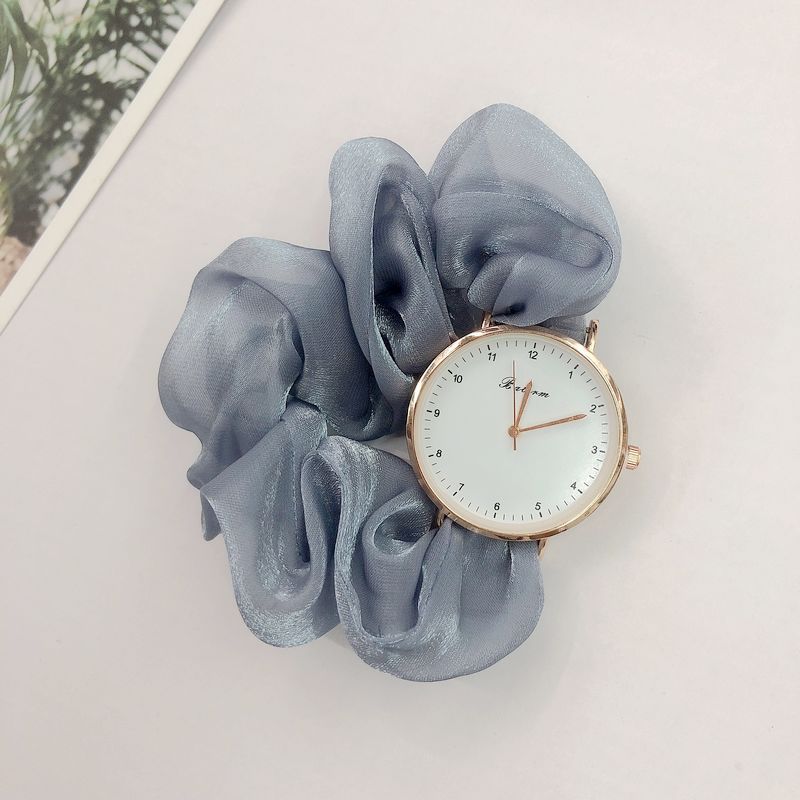 Ladies watch with a scrunchie bracelet