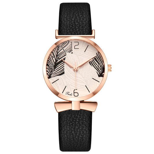 Minimalistic ladies watch with leaf motif